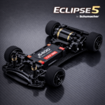Carbon fiber chassis of Schumacher Eclipse 5 RC car with motor and foam tires